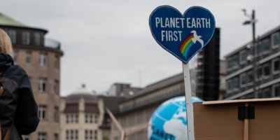 sign saying planet earth first © Tobias VJ