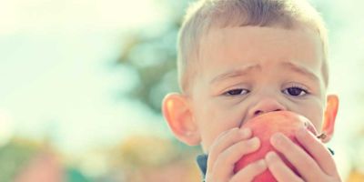 Child eating Apple
