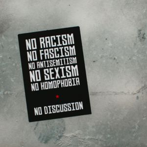 Sticker with no racism no fascism slogans / CCO markus-spiske