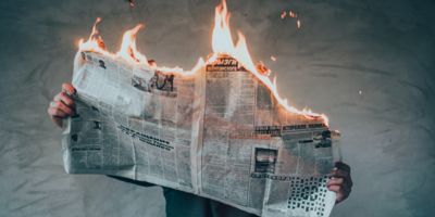 Newspaper burning