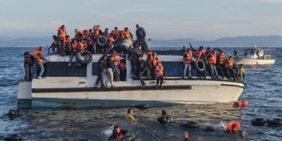 Syrian and Iraqi refugees arrive from Turkey to Lesbos, Greece