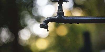 Water tap - Photo by Luis Tosta on Unsplash