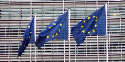 EU flags in front of Commission building