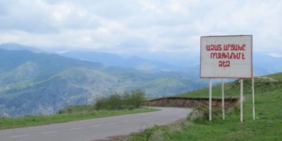 A roadside sign welcomes travellers arriving in the Republic of Nagorno Karabakh