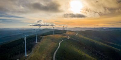 Wind turbines on hill ridge/ CC0 Nuno Marques