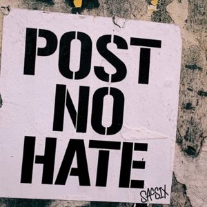 Poster on a wall saying no to hate speech