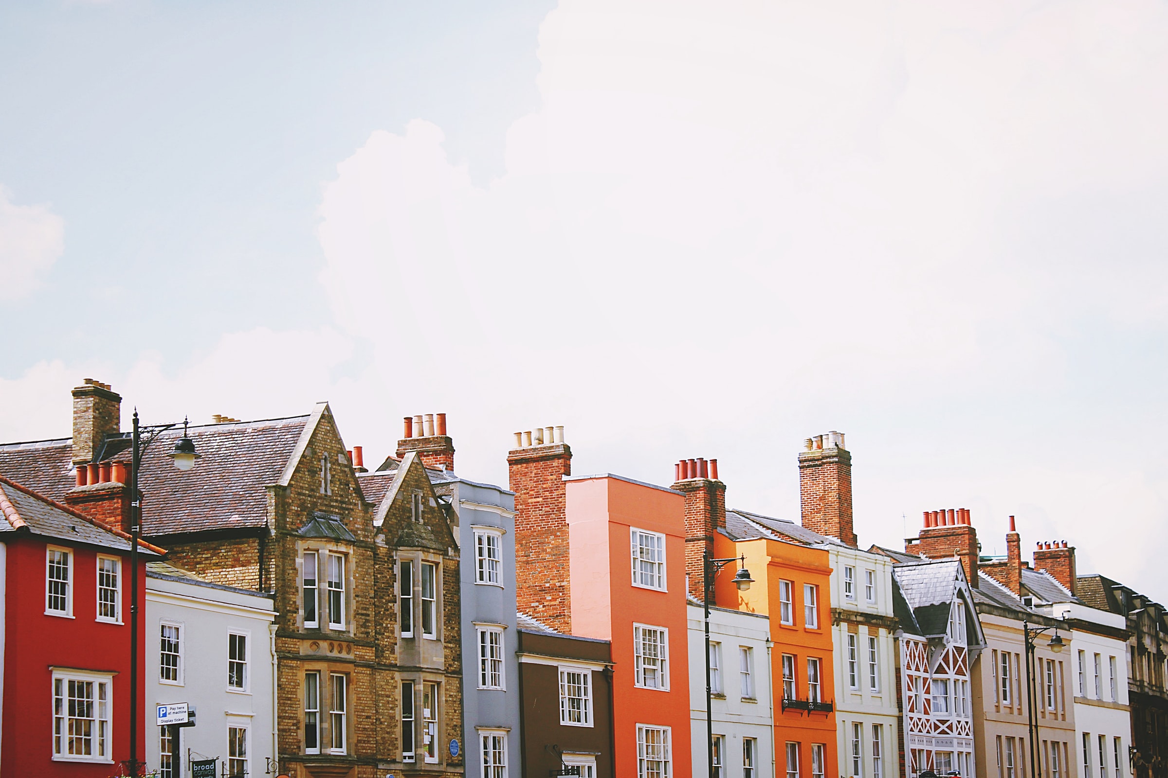 Row of houses/ toa-heftiba Unsplash