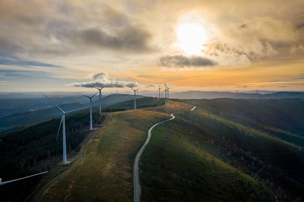 Wind turbines on hill ridge/ CC0 Nuno Marques