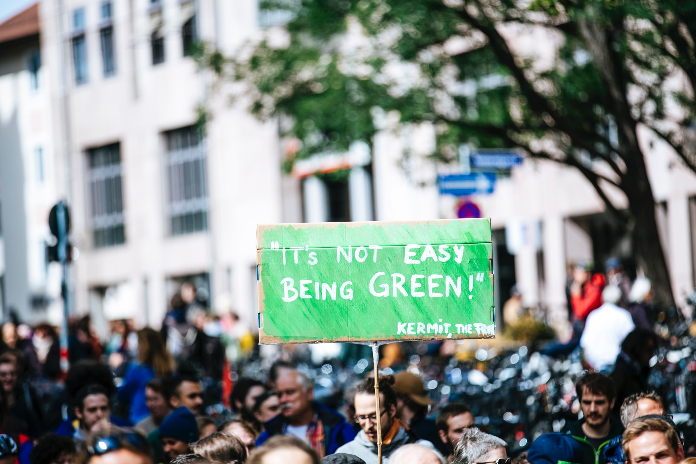 People demonstrating holding a sign